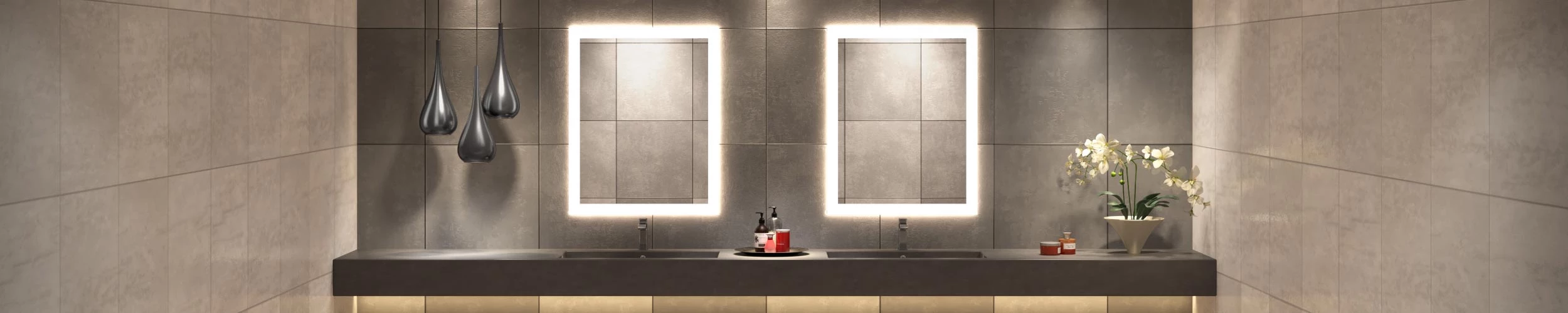 Grand Mirrors Lumiere inset on a grid patterned concrete wall with two concrete sinks below in Oman.